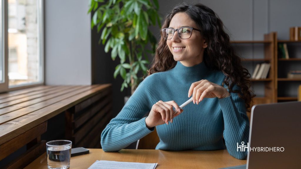 A woman working from home and happy