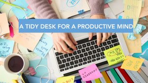 An overhead shot of a tidy desk for mental health and a productive mind
